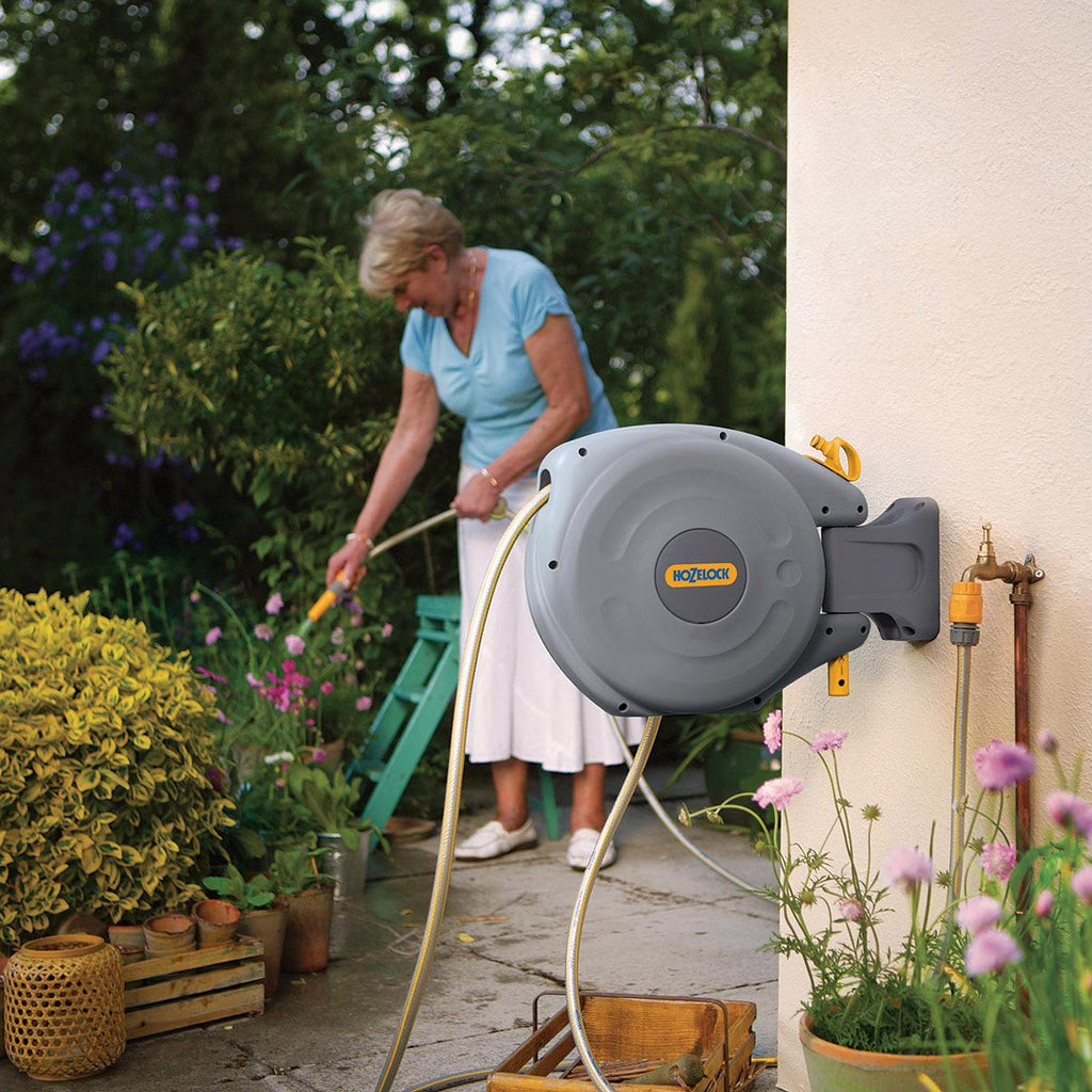http://phairs.com/cdn/shop/products/hozelock-auto-wall-mounted-retractable-hose-reel-with-10m-hose-in-use_1024x.jpg?v=1648650500